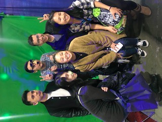 A group of people posing for the camera.