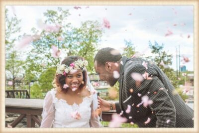 A man and woman are smiling at each other.