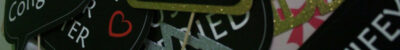 A close up of the word " glitter ".