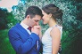 A man and woman standing next to each other.